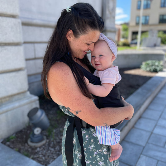 Tessa is with Violet , 11 months old, wearing size 12m clothes