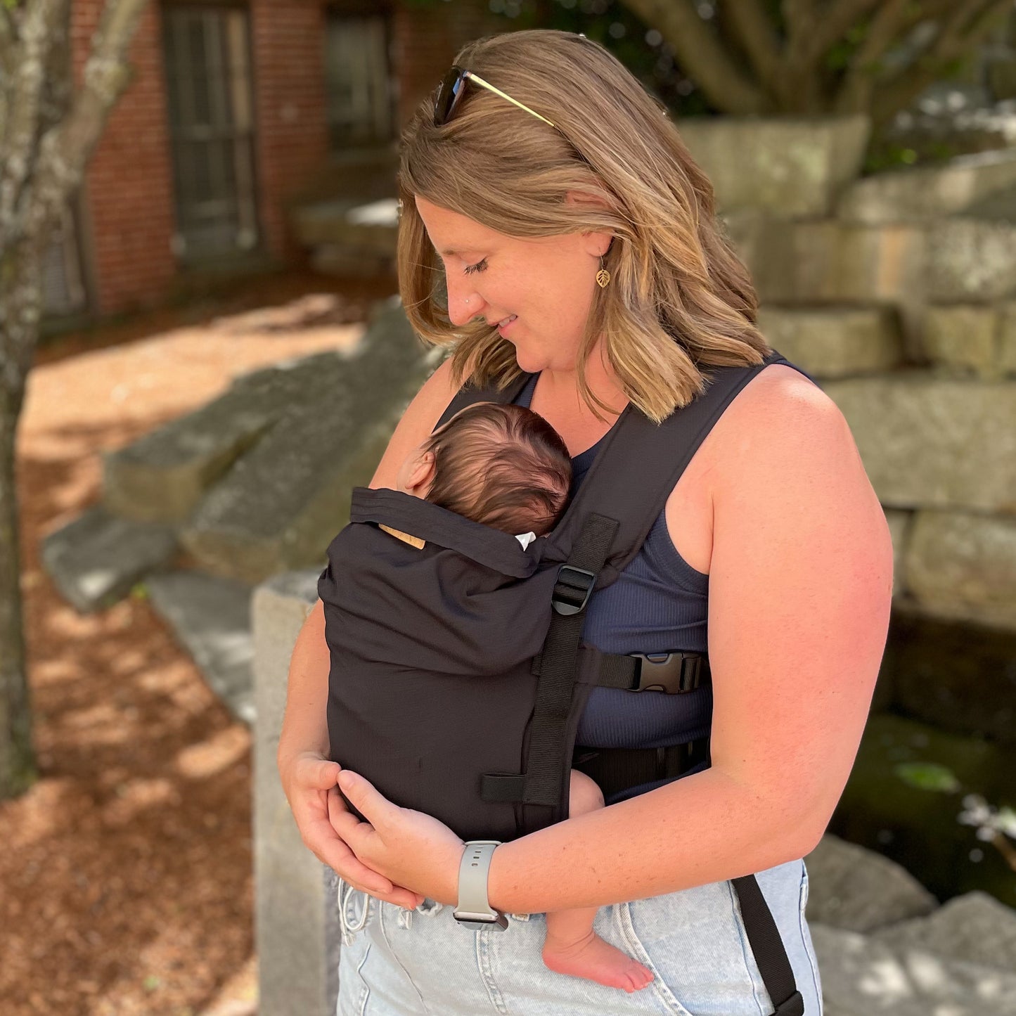 Lydia is with Olive, 2 months old, wearing size 0-3m clothes