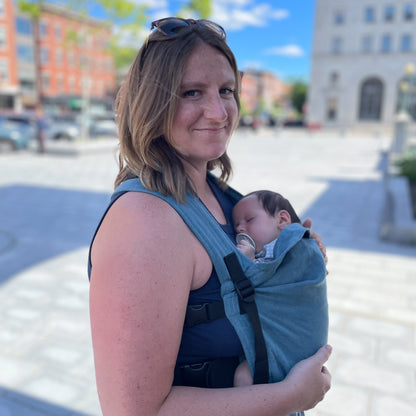 Lydia is with Olive, 2 months old, wearing size 0-3m clothes