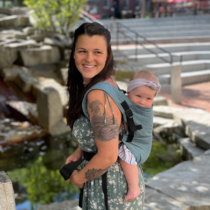 Tessa is with Violet , 11 months old, wearing size 12m clothes