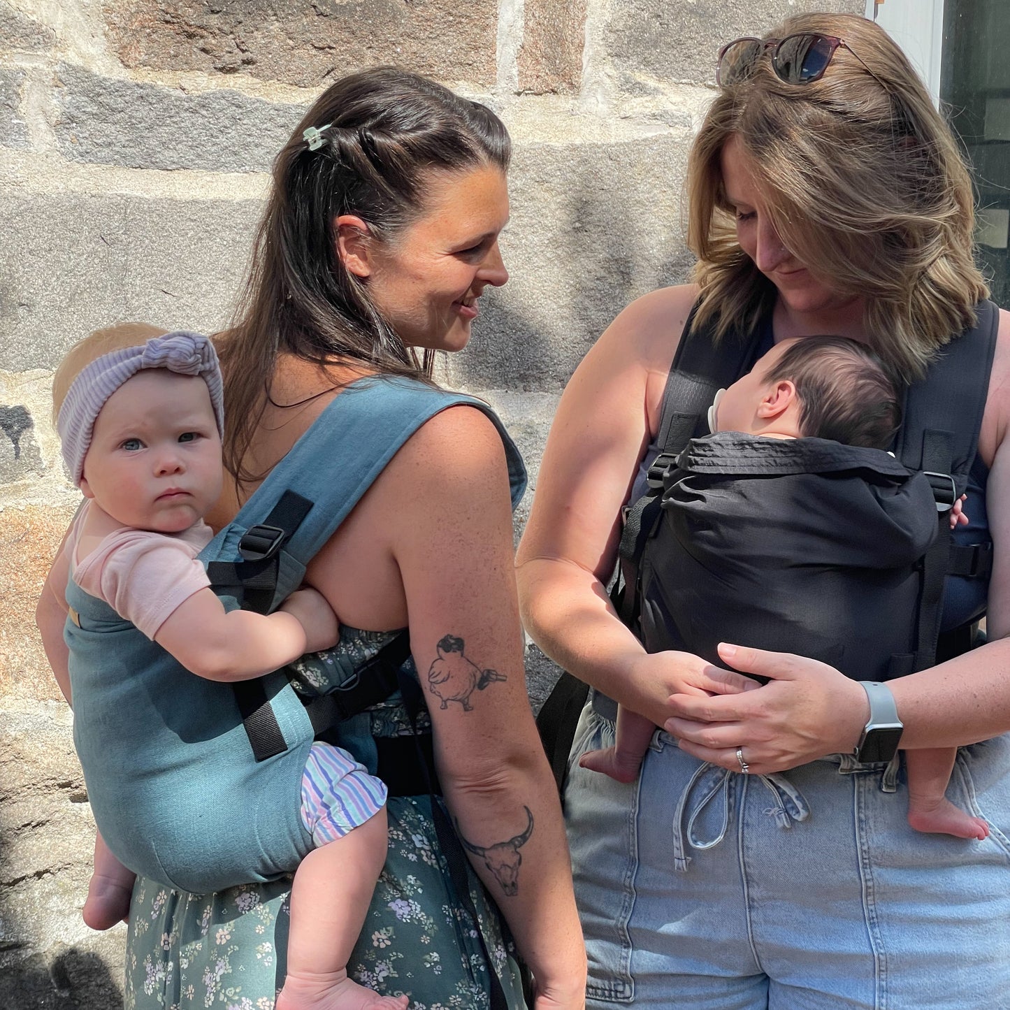 (left) Tessa is with Violet , 11 months old, wearing size 12m clothes (right) Lydia is with Olive, 2 months old, wearing size 0-3m clothes